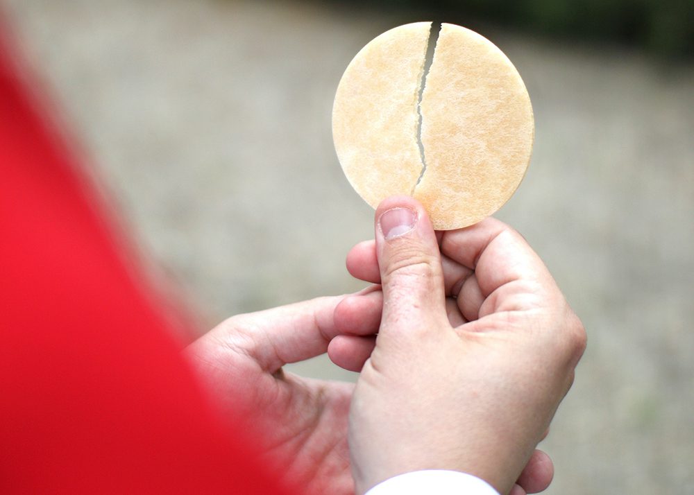 Being Catholic. Photo of Eucharistic host