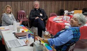 Prison ministry is just part of Father François' work. Seen here, he also does Crusillo retreats and more.
